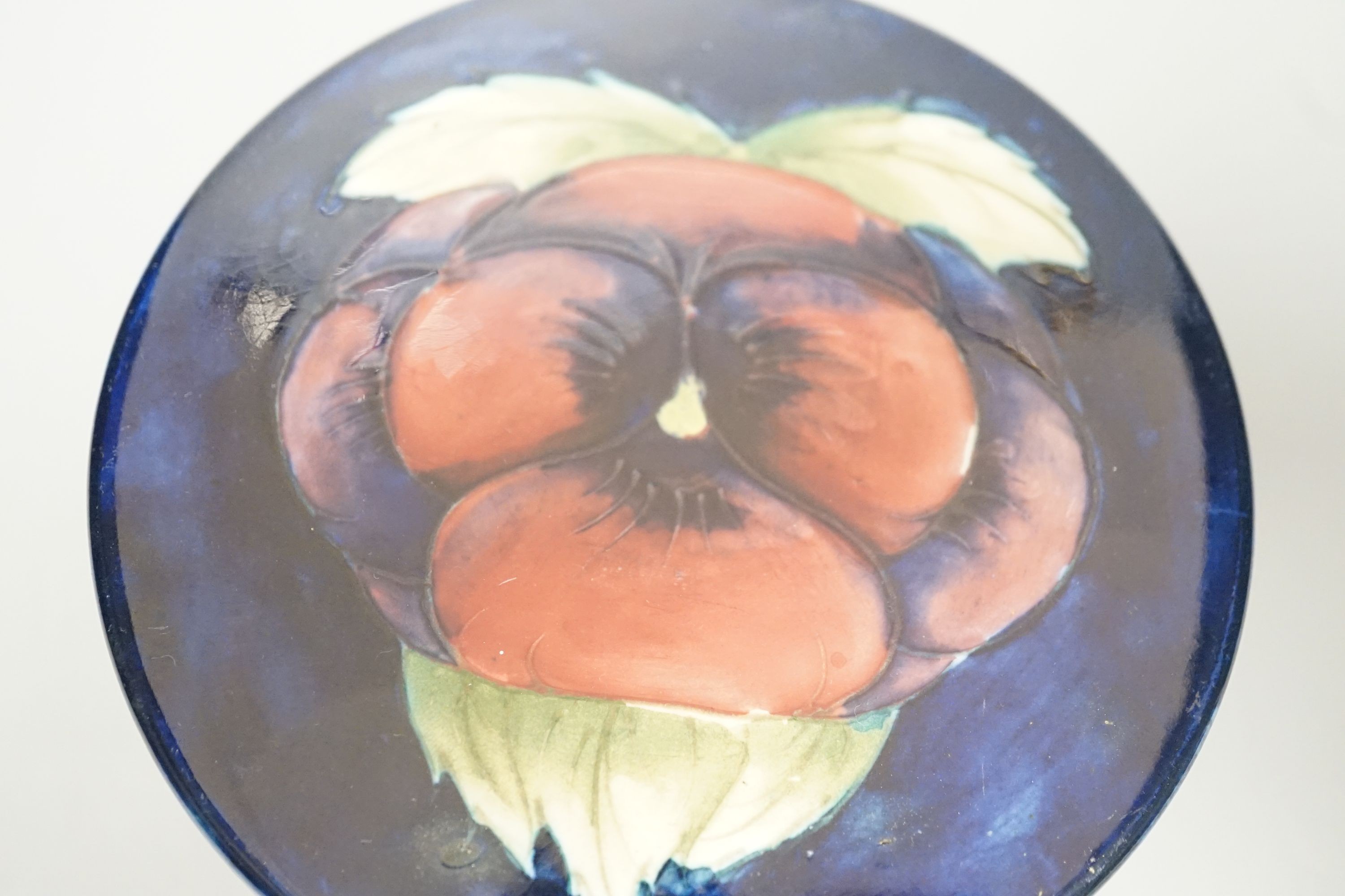 A Moorcroft pansy pattern circular box and cover, diameter 12cm